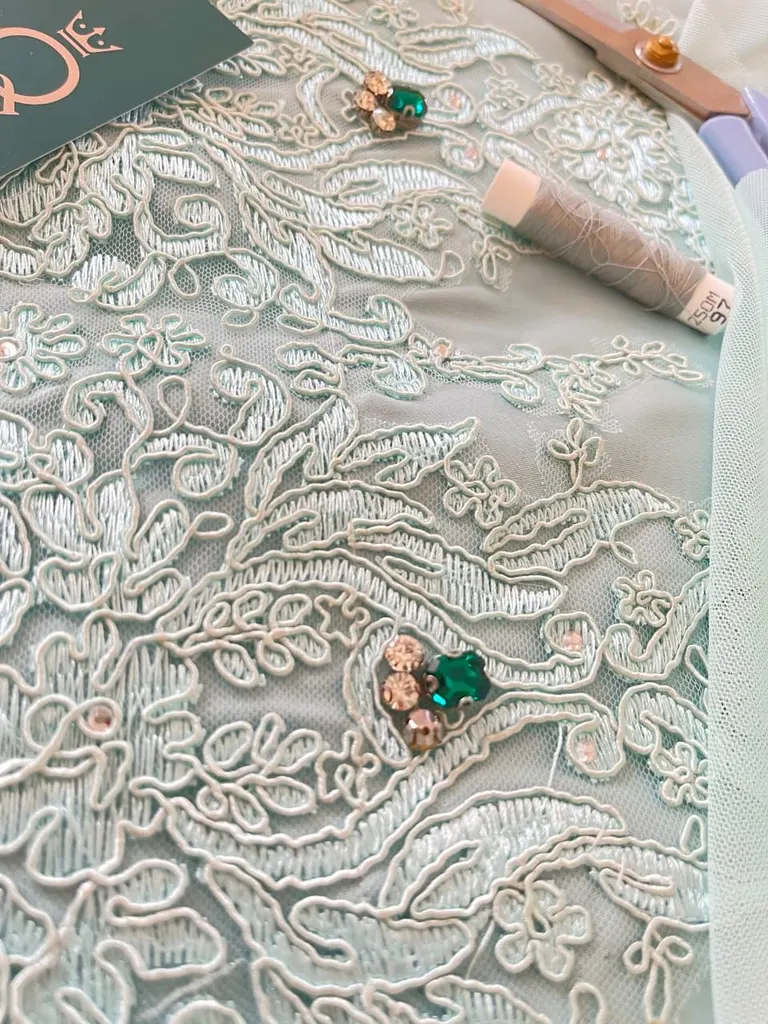 Beaded French lace with crystal accents on tulle, in progress at the atelier